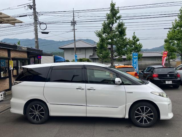 エスティマハイブリッド アエラス　レザーパッケージ　４ＷＤ　ＥＴＣ　バックカメラ　ＨＤＤナビＴＶ　オートクルーズコントロール　両側電動スライドドア　オートライト　ＨＩＤ　電動リアゲート　電動格納サードシート　スマートキー　アイドリングストップ（12枚目）