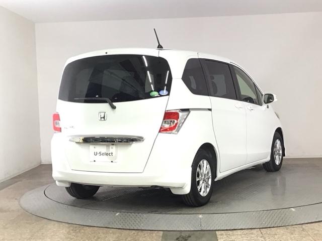 フリード Gジャストセレクション HID・ワンセグ・メモリナビ・バックカメラ・社外AW・片側電動ドア・ETC Bモニター スマトキー 助手席エアバッグ AUTOエアコン 1セグ パワステ ナビTV 両側スライド片側電動 PW ABS(4枚目)