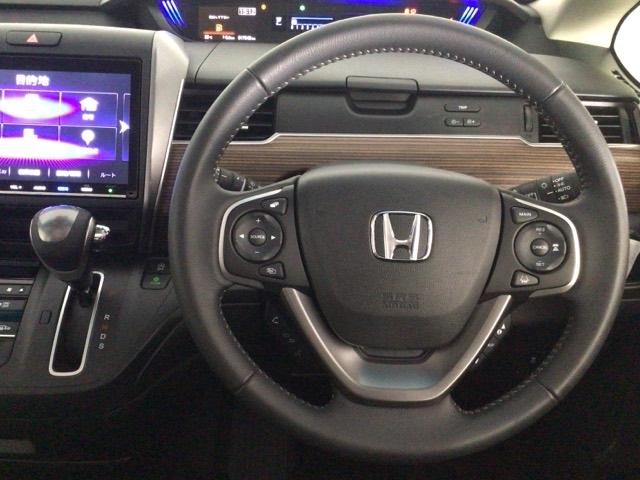 フリード+ クロスターブラックスタイル デモカーUP・LED・フルセグ・メモリナビ・バックカメラ・純正AW・ETC サイドエアバック 地デジフルセグ DVD 前後誤発進抑制 シートヒーター 両側電動スライドドア 助手席エアバッグ キーレス(17枚目)