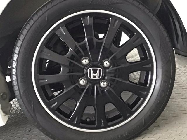 N-BOXカスタム 2トーンカラースタイルG・ターボLパッケージ HID・ワンセグ・メモリナビ・バックカメラ・純正AW・両側電動ドア・ETC キーレスエントリー パワーステアリング ナビTV 横滑り防止機能 パワーウィンドウ エアコン スマートキー ABS ターボ車(12枚目)