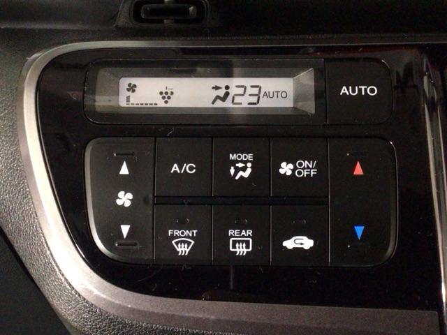 N-BOXカスタム 2トーンカラースタイルG・ターボLパッケージ HID・ワンセグ・メモリナビ・バックカメラ・純正AW・両側電動ドア・ETC キーレスエントリー パワーステアリング ナビTV 横滑り防止機能 パワーウィンドウ エアコン スマートキー ABS ターボ車(18枚目)
