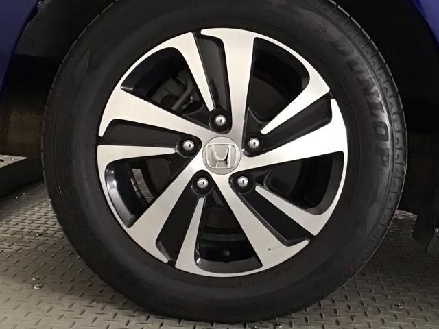 フリードハイブリッド ハイブリッド・EX LED・フルセグ・メモリナビ・バックカメラ・純正AW・シートヒーター・ETC 地デジフルセグTV シ-トヒ-タ- リヤカメラ LEDライト フルオートエアコン ABS DVD再生可 ウォークスルー(11枚目)