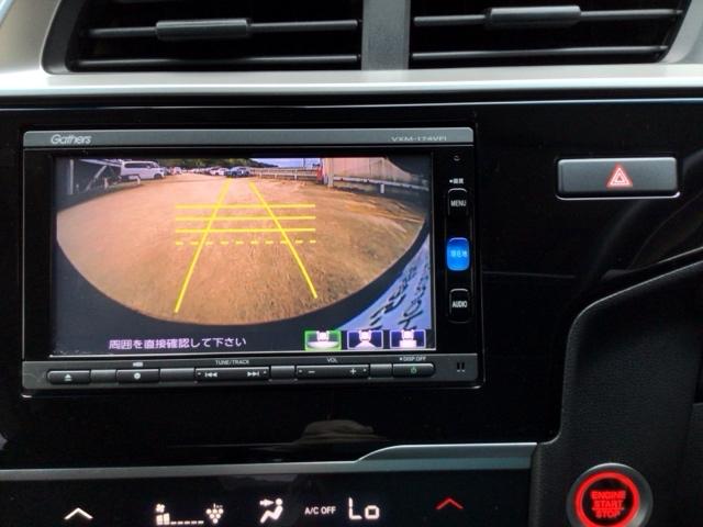 フィット １３Ｇ・Ｌホンダセンシング　ＬＥＤ・ワンセグ・メモリナビ・ＤＶＤ・バックカメラ・ＥＣＯＮスイッチ・ＥＴＣ　ＥＴＣ車載器　ＤＶＤ再生可　ナビ＆ＴＶ　サイドカーテンエアバック　ＵＳＢ　リアカメラ　エアバック　パワーウインドウ　ＶＳＡ（8枚目）