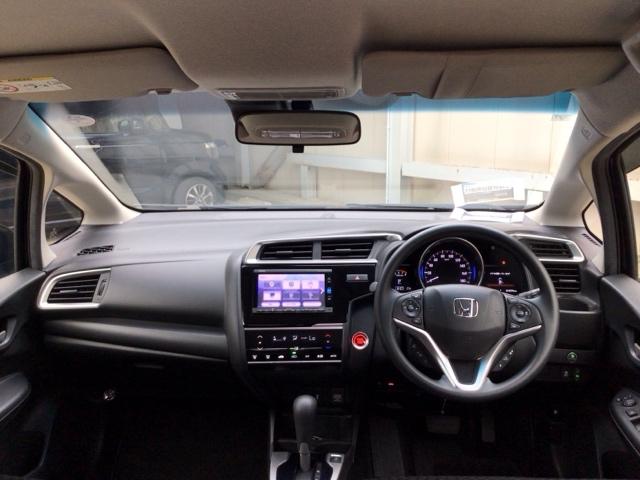 フィット １３Ｇ・Ｌホンダセンシング　ＬＥＤ・ワンセグ・メモリナビ・ＤＶＤ・バックカメラ・ＥＣＯＮスイッチ・ＥＴＣ　ＥＴＣ車載器　ＤＶＤ再生可　ナビ＆ＴＶ　サイドカーテンエアバック　ＵＳＢ　リアカメラ　エアバック　パワーウインドウ　ＶＳＡ（16枚目）
