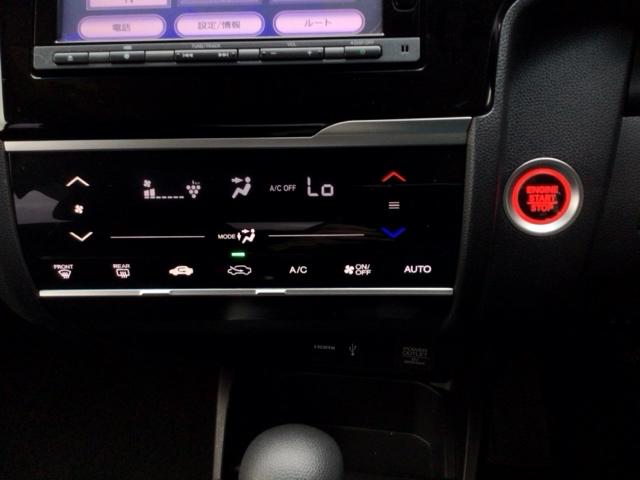 フィット １３Ｇ・Ｌホンダセンシング　ＬＥＤ・ワンセグ・メモリナビ・ＤＶＤ・バックカメラ・ＥＣＯＮスイッチ・ＥＴＣ　ＥＴＣ車載器　ＤＶＤ再生可　ナビ＆ＴＶ　サイドカーテンエアバック　ＵＳＢ　リアカメラ　エアバック　パワーウインドウ　ＶＳＡ（18枚目）