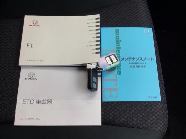 フィット １３Ｇ・Ｌホンダセンシング　ＬＥＤ・ワンセグ・メモリナビ・ＤＶＤ・バックカメラ・ＥＣＯＮスイッチ・ＥＴＣ　ＥＴＣ車載器　ＤＶＤ再生可　ナビ＆ＴＶ　サイドカーテンエアバック　ＵＳＢ　リアカメラ　エアバック　パワーウインドウ　ＶＳＡ（19枚目）