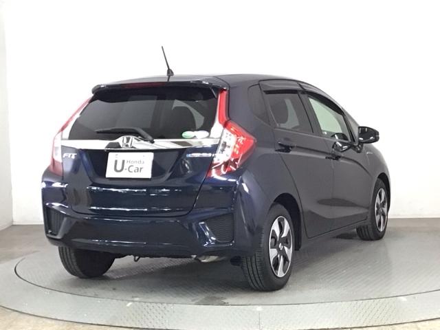 フィットハイブリッド Ｌパッケージ　ＬＥＤ・フルセグ・メモリナビ・ＤＶＤ・バックカメラ・ＥＣＯＮスイッチ・ＥＴＣ　ナビ＆ＴＶ　地デジフルセグＴＶ　サイドエアバック　ＤＶＤ再生　オートクルーズコントロール　イモビライザー　ＥＳＣ　ＡＢＳ（5枚目）