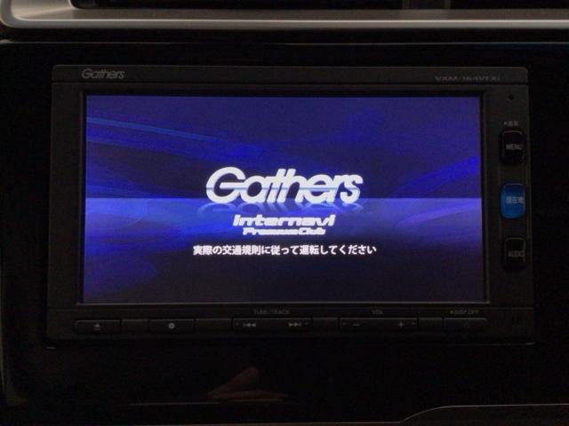 フィットハイブリッド Ｌパッケージ　ＬＥＤ・フルセグ・メモリナビ・ＤＶＤ・バックカメラ・ＥＣＯＮスイッチ・ＥＴＣ　ナビ＆ＴＶ　地デジフルセグＴＶ　サイドエアバック　ＤＶＤ再生　オートクルーズコントロール　イモビライザー　ＥＳＣ　ＡＢＳ（6枚目）