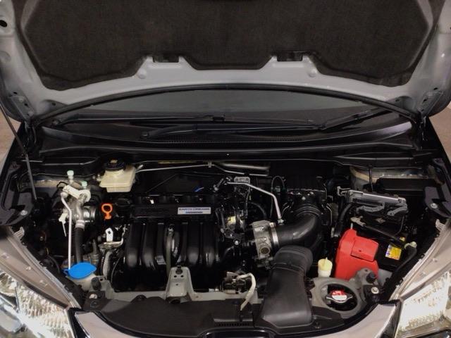 フィットハイブリッド Ｌパッケージ　ＬＥＤ・フルセグ・メモリナビ・ＤＶＤ・バックカメラ・ＥＣＯＮスイッチ・ＥＴＣ　ナビ＆ＴＶ　地デジフルセグＴＶ　サイドエアバック　ＤＶＤ再生　オートクルーズコントロール　イモビライザー　ＥＳＣ　ＡＢＳ（20枚目）