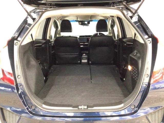 フィットハイブリッド Ｌパッケージ　ＬＥＤ・フルセグ・メモリナビ・ＤＶＤ・バックカメラ・ＥＣＯＮスイッチ・ＥＴＣ　ナビ＆ＴＶ　地デジフルセグＴＶ　サイドエアバック　ＤＶＤ再生　オートクルーズコントロール　イモビライザー　ＥＳＣ　ＡＢＳ（23枚目）