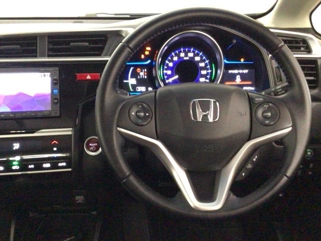 フィットハイブリッド Lパッケージ LED・フルセグ・メモリナビ・DVD・バックカメラ・ECONスイッチ・ETC ナビ&TV 地デジフルセグTV サイドエアバック DVD再生 オートクルーズコントロール イモビライザー ESC ABS(17枚目)