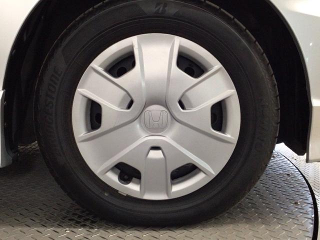 フリードスパイクハイブリッド ジャストセレクション　ＨＩＤ・フルセグ・メモリナビ・ＤＶＤ・バックカメラ・ＥＣＯＮスイッチ・ＥＴＣ　Ｓキー　キーフリー　横滑り防止機能　ＤＶＤ視聴　後カメラ　地デジ　ナビＴＶ　エアコン　両側スライド片側電動　ＡＢＳ（23枚目）