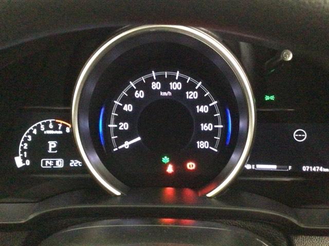 フィット １３Ｇ・Ｌホンダセンシング　ＬＥＤ・フルセグ・メモリナビ・ＤＶＤ・バックカメラ・ＥＣＯＮスイッチ・ＥＴＣ　衝突軽減　盗難防止装置　ＬＥＤライト　オートエアコン　ＶＳＡ　スマ－トキ－　キーフリー　クルコン　サイドエアバッグ　４ＷＤ（12枚目）