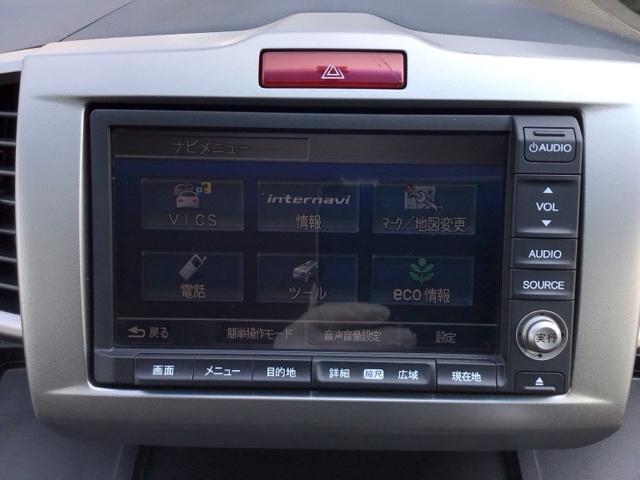 フリードハイブリッド ジャストセレクション　ＨＩＤ・ワンセグ・メモリナビ・バックカメラ・両側電動ドア・デジタルメーター　ナビテレビ　セキュリティー　横滑り防止機能　オートクルーズ　エアバック　ウォークスルー　ＤＶＤ再生可能　キーレスエントリー（6枚目）