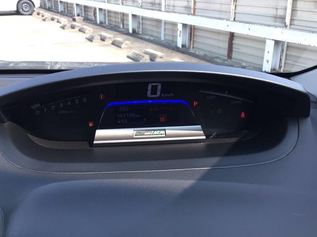 フリードハイブリッド ジャストセレクション　ＨＩＤ・ワンセグ・メモリナビ・バックカメラ・両側電動ドア・デジタルメーター　ナビテレビ　セキュリティー　横滑り防止機能　オートクルーズ　エアバック　ウォークスルー　ＤＶＤ再生可能　キーレスエントリー（11枚目）