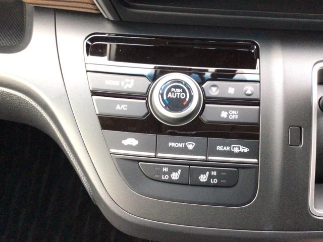 フリード＋ クロスターブラックスタイル　デモカーＵＰ・ＬＥＤ・フルセグ・メモリナビ・純正ＡＷ・シートヒーター　サイドエアバック　地デジフルセグ　ＤＶＤ　前後誤発進抑制　両側電動スライドドア　バックカメラ　助手席エアバッグ　フルオートエアコン（18枚目）