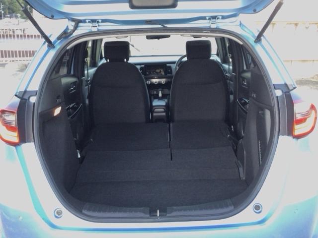 フィット ｅ：ＨＥＶネス　ＬＥＤ・オーディオレス・純正ＡＷ・スマートキー・ＥＣＯスイッチ・パーキングブレーキ　衝突軽減　パーキングセンサー　サイドカーテンエアバック　オートエアコン　スマキー　エアバッグ　ＥＴＣ　ＶＳＡ　イモビ（24枚目）