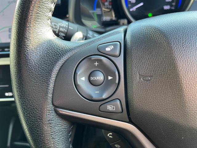 フィットハイブリッド Ｓホンダセンシング　Ｈｏｎｄａ純正フルセグＮＡＶＩ・ＨｏｎｄａＳＥＮＳＩＮＧ・ＬＥＤヘッドライトドラレコ・アルミホイール　スマ－トキ－　ナビＴＶ　アクティブクルーズコントロール　パワーウインドウ　ドライブレコーダ　ＡＡＣ（12枚目）
