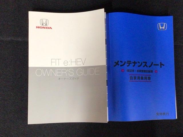 フィット ｅ：ＨＥＶホーム　レンタＵＰ・フルセグ・メモリナビ・バックカメラ・ホンダＣＯＮＮＥＣＴ・ＥＴＣ　前後誤発進抑制機能　クリソナ　助手席エアバッグ　運転席エアバッグ　アイドリングストップ　ＬＥＤライト　ＵＳＢ接続　ＡＢＳ（34枚目）