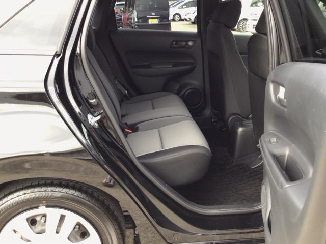 フィット ベーシック　デモカーＵＰ・ＣＤチューナー・スマートキー・マニュアルエアコン・ＥＴＣ　コーナーセンサー　横滑防止装置　オートエアコン　パワーウインドウ　盗難防止システム　オートクルーズコントロール　ＡＢＳ（23枚目）