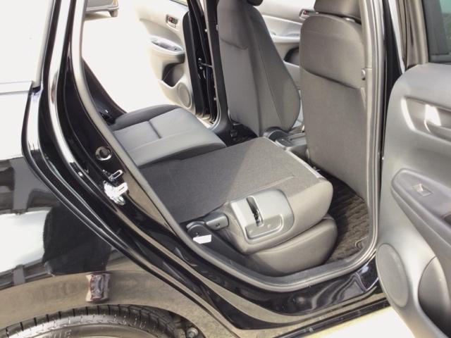 フィット ベーシック　デモカーＵＰ・ＣＤチューナー・スマートキー・マニュアルエアコン・ＥＴＣ　コーナーセンサー　横滑防止装置　オートエアコン　パワーウインドウ　盗難防止システム　オートクルーズコントロール　ＡＢＳ（25枚目）