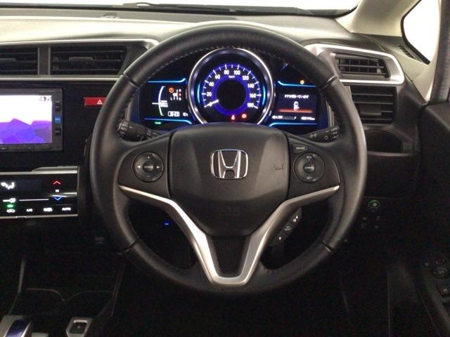 フィットハイブリッド Ｌパッケージ　ＬＥＤ・フルセグ・メモリナビ・ＤＶＤ・バックカメラ・ＥＣＯＮスイッチ・ＥＴＣ　ナビ＆ＴＶ　地デジフルセグＴＶ　サイドエアバック　ＤＶＤ再生　オートクルーズコントロール　イモビライザー　ＥＳＣ　ＡＢＳ（11枚目）