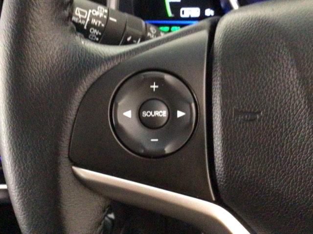 フィットハイブリッド Ｌパッケージ　ＬＥＤ・フルセグ・メモリナビ・ＤＶＤ・バックカメラ・ＥＣＯＮスイッチ・ＥＴＣ　ナビ＆ＴＶ　地デジフルセグＴＶ　サイドエアバック　ＤＶＤ再生　オートクルーズコントロール　イモビライザー　ＥＳＣ　ＡＢＳ（14枚目）