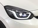 フィット ｅ：ＨＥＶホームブラックスタイル　デモカーＵＰ・ＬＥＤ・フルセグ・メモリナビ・純正ＡＷ・ホンダＣＯＮＮＥＣＴ　Ｂカメラ　ＬＥＤライト　クリアランスソナー　サイドＳＲＳ　オートクルーズコントロール　フルオートエアコン　ＶＳＡ　衝突軽減（3枚目）