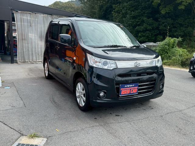 ワゴンRスティングレー X 禁煙車 ETC ナビ TV CD ミュージックプレイヤー接続可 HIDヘッドライト スマートキー オートエアコン AW14インチ 電動格納ミラー ベンチシート フルフラット アイドリングストップ(3枚目)