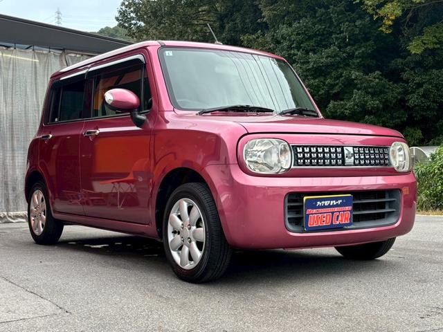 アルトラパン 10thアニバーサリーリミテッド 禁煙車 CD スマートキー オートエアコン シートヒーター 電動格納ミラー AW14インチ ベンチシート フルフラット 盗難防止システム パワーウィンドウ パワーステアリング 運転席・助手席エアバック(3枚目)