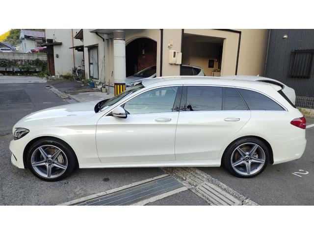 Cクラスステーションワゴン C200 ステーションワゴン スポーツ本革仕様 レーダーセーフティパッケージ ディストロニックプラス 前後ドラレコ 赤革シート ヘッドアップディスプレイ ブラインドスポット パワーバックドア AMG純正18インチ ミシュランタイヤ スペアキー(12枚目)