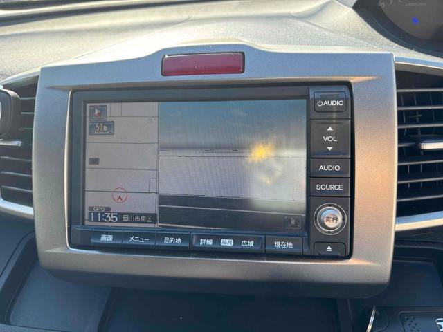 フリードスパイクハイブリッド ジャストセレクション ハイブリッド ETC バックカメラ ナビ TV 両側電動スライドドア オートクルーズコントロール オートライト HID スマートキー 電動格納ミラー CVT 盗難防止システム 衝突安全ボディ(5枚目)