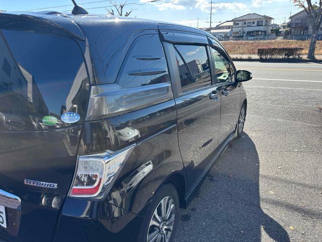 フリードスパイクハイブリッド ジャストセレクション ハイブリッド ETC バックカメラ ナビ TV 両側電動スライドドア オートクルーズコントロール オートライト HID スマートキー 電動格納ミラー CVT 盗難防止システム 衝突安全ボディ(14枚目)