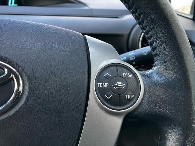 アクア Ｇブラックソフトレザーセレクション　バックカメラ　オートエアコン　スマートキー　オートライト　電動格納ミラー　ＡＢＳ　横滑り防止装置　パワーウィンドウ　パワーステアリング　アイドリングストップ　運転席・助手席エアバック（11枚目）