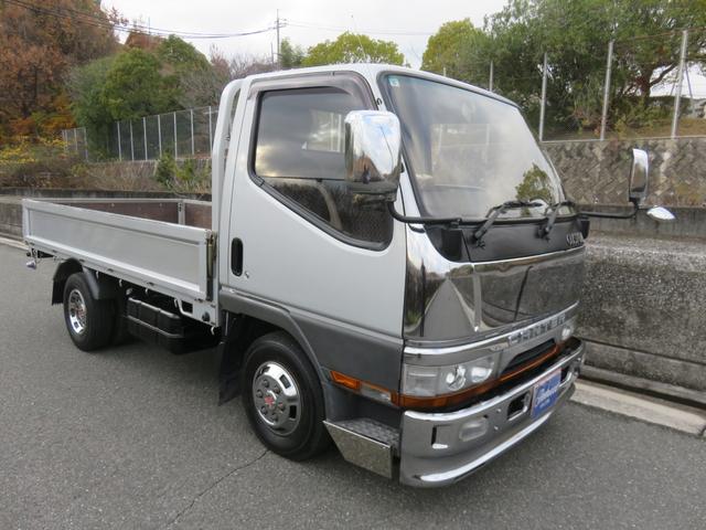 キャンター ロング全低床　ガッツ　ディーゼル　カスタム　オートエアコン　パワーウィンドウ　パワステ　モケットシート　両側電動格納＆調整ミラー　ＦＭラジオ　ブロンズガラス　集中ドアロック　排気ブレーキ　全車検時点検記録簿（3枚目）