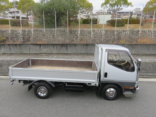 キャンター ロング全低床　ガッツ　ディーゼル　カスタム　オートエアコン　パワーウィンドウ　パワステ　モケットシート　両側電動格納＆調整ミラー　ＦＭラジオ　ブロンズガラス　集中ドアロック　排気ブレーキ　全車検時点検記録簿（25枚目）