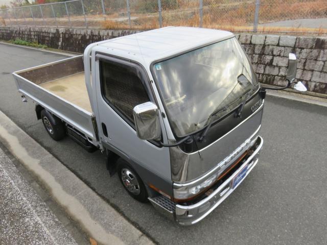 キャンター ロング全低床　ガッツ　ディーゼル　カスタム　オートエアコン　パワーウィンドウ　パワステ　モケットシート　両側電動格納＆調整ミラー　ＦＭラジオ　ブロンズガラス　集中ドアロック　排気ブレーキ　全車検時点検記録簿（35枚目）