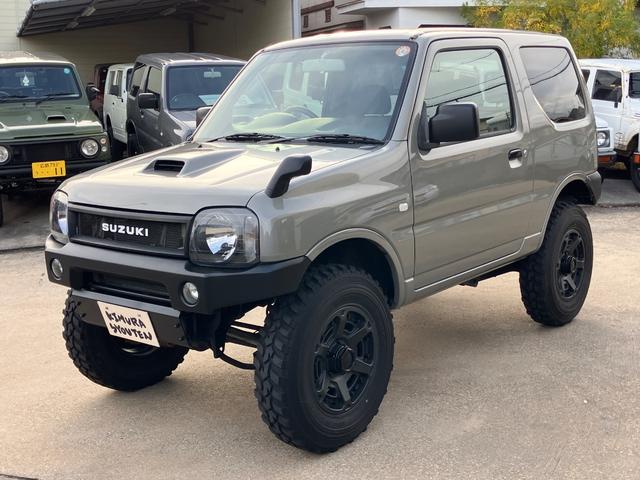 ジムニー ＸＣ　リフトアップ　社外マフラー　社外１６インチアルミ　社外ステアリング　５速ＭＴ　新品Ｂｌｕｅｔｏｏｔｈオーディオ　キーレス（11枚目）