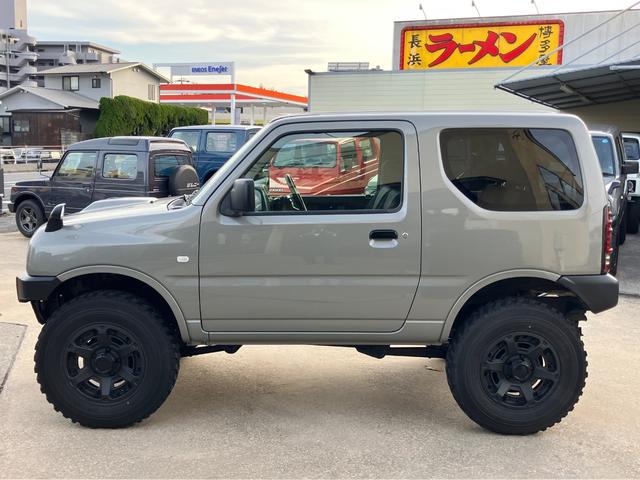 ジムニー ＸＣ　リフトアップ　社外マフラー　社外１６インチアルミ　社外ステアリング　５速ＭＴ　新品Ｂｌｕｅｔｏｏｔｈオーディオ　キーレス（16枚目）