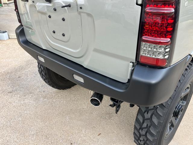 ジムニー ＸＣ　リフトアップ　社外マフラー　社外１６インチアルミ　社外ステアリング　５速ＭＴ　新品Ｂｌｕｅｔｏｏｔｈオーディオ　キーレス（23枚目）