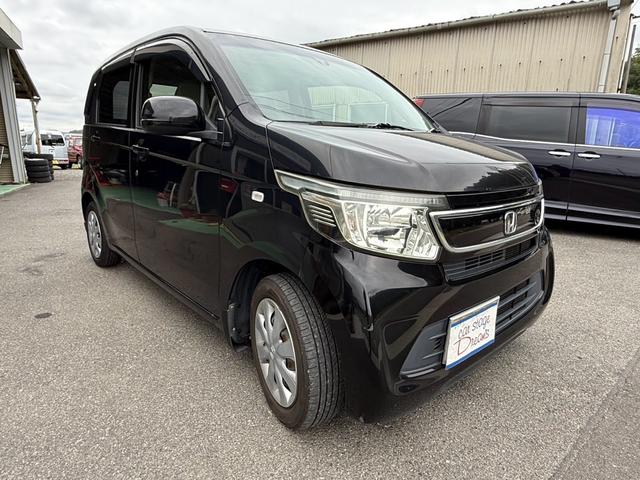 Ｎ－ＷＧＮ Ｇ・Ｌパッケージ　ＥＴＣ　ナビ　バックカメラ　ＨＩＤヘッドライト　オートライト　スマートキー　オートエアコン　電動格納ミラー　アイドリングストップ　ベンチシート　盗難防止システム　ＡＢＳ　横滑り防止装置（3枚目）