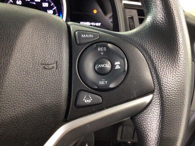 フィット 13G・F ワンセグ・メモリナビ・CD・バックカメラ・社外AW・スマートキー・ETC リヤカメラ アクティブクルーズ 衝突被害軽減 イモビライザー 1セグTV 助手席エアバック キーレス AAC ワンオーナー(5枚目)