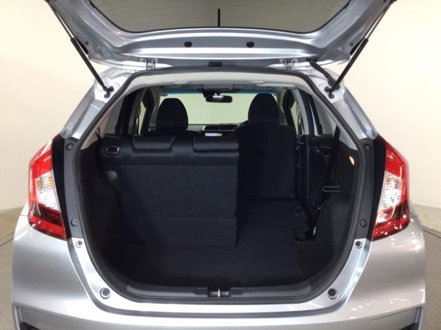 フィット 13G・F ワンセグ・メモリナビ・CD・バックカメラ・社外AW・スマートキー・ETC リヤカメラ アクティブクルーズ 衝突被害軽減 イモビライザー 1セグTV 助手席エアバック キーレス AAC ワンオーナー(13枚目)