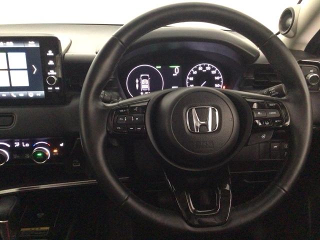 ヴェゼル ｅ：ＨＥＶＺ　ＬＥＤ・ホンダＣＯＮＮＥＣＴ・メモリナビ・バックカメラ・シートヒーター・ＥＴＣ　盗難防止装置　Ｒカメラ　フルセグテレビ　スマ－トキ－　ＥＴＣ車載器　アクティブクルーズ　Ｐセンサー　サイドエアバッグ（17枚目）