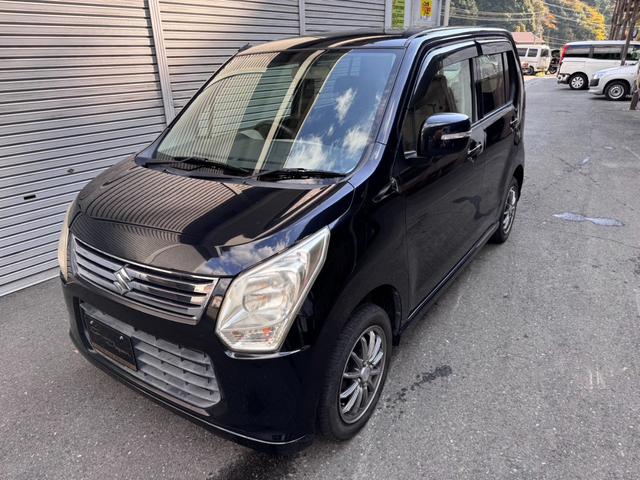 ワゴンR FXリミテッド 4WD アイドリングストップ機能搭載車 シートヒーター 純正デッキ オートライト オートエアコン ETC(2枚目)