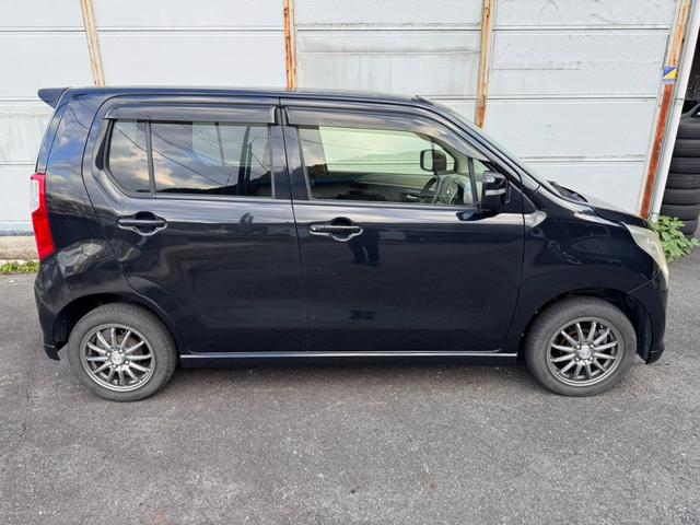 ワゴンR FXリミテッド 4WD アイドリングストップ機能搭載車 シートヒーター 純正デッキ オートライト オートエアコン ETC(14枚目)