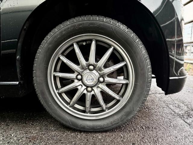 ワゴンR FXリミテッド 4WD アイドリングストップ機能搭載車 シートヒーター 純正デッキ オートライト オートエアコン ETC(36枚目)