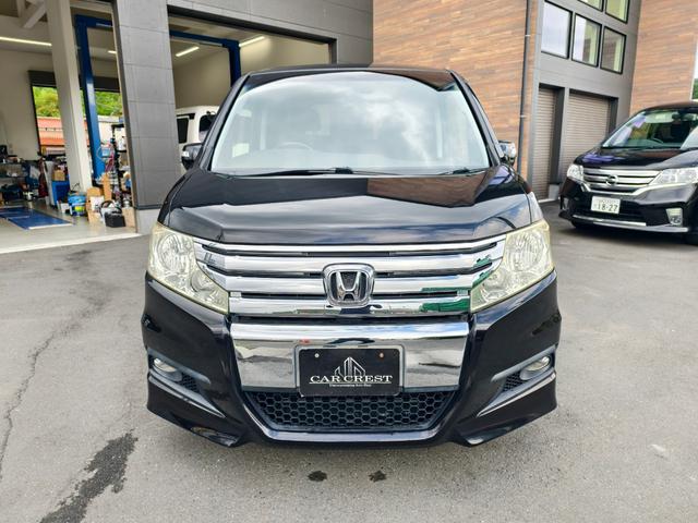 ステップワゴンスパーダ Ｚ　横滑防止　イモビ　スマキー　地デジＴＶ　フルフラットシート　バックモニタ－　キーフリー　パワーウィンド　ＨＤＤナビエディション　ＥＴＣ付　ナビ・ＴＶ　運転席助手席エアバック　エアバック　衝突安全ボディ（2枚目）