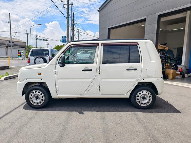 ネイキッド Ｇパッケージ　ワンオーナー　点検整備記録簿　ガレージ保管車　キーレス　パワーウインドウ　エアコン　エアバッグ　デュアルエアバック　パワステ（5枚目）