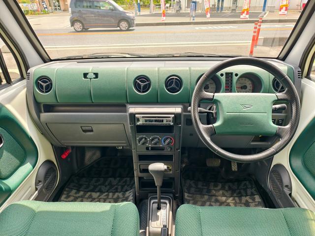 ネイキッド Ｇパッケージ　ワンオーナー　点検整備記録簿　ガレージ保管車　キーレス　パワーウインドウ　エアコン　エアバッグ　デュアルエアバック　パワステ（9枚目）